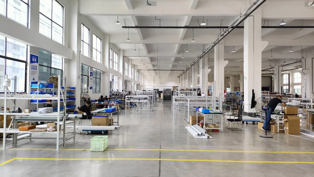 Large-format 3D printer assembly at a reviewed partner factory